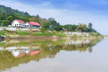 Fototapeta na wymiar Beautiful scenery along Mekong river with reflection , Nong Khai , Thailand