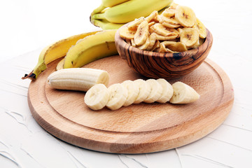 dried banana on white background.Homemade Dehydrated Banana Chips.