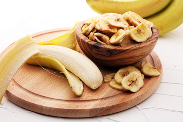 dried banana on white background.Homemade Dehydrated Banana Chips.