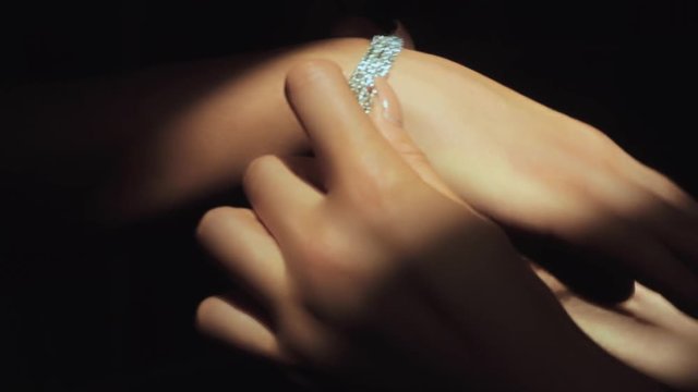 The bracelet on her arm