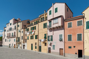 Fototapeta na wymiar The old-fashioned colorful houses in Liguria region of Italy