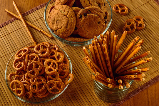 Oatmeal Cookies, Pretzels, Bread Sticks In A Glass Container For Tea