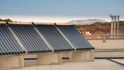 Solar Thermal Panel on roof in winter, Synchrotron in Trieste, Italy