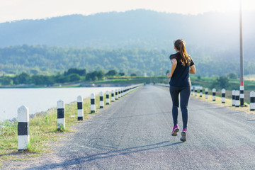 Young woman jogging in nature