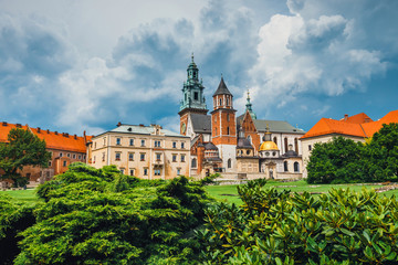 Fototapeta na wymiar Cathedral on wawel hill with the stormy clouds in the background