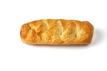 Baked bun on a white background close-up. Isolate.