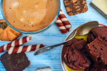 still life of baked goods and coffee on a light wooden background 