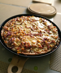 Delicious Pizza with Corn, Cheese, Ham & Onion