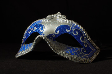Sexy domino mask seduction concept