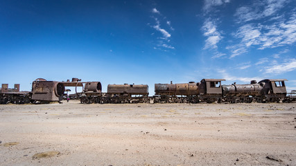 Rusty old train at the Train Cemetery in Uyuni desert, Bolivia, South America