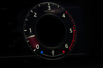 Tachometer in the new car. Digital.