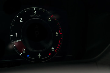Tachometer in the new car. Abstract view with rpm numbers