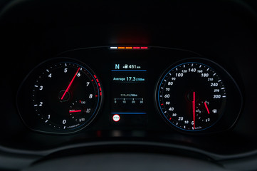 Tachometer and speedometer in the new car.