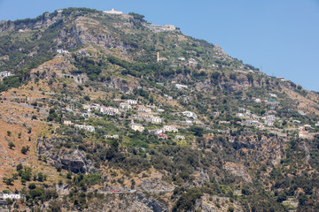 Fototapeta na wymiar Exclusive villas and apartments on the rocky coast of Amalfi. Campania. Italy