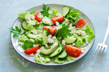 Green salad with avocado and feta