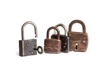 Retro style padlocks. metal textures and pattern. one opened, three closed. White background