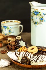 Home cookies on a dining table. Unhealthy sweet food. Dangers of obesity and diabetes.