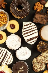 Home cookies on a dining table. Unhealthy sweet food. Dangers of obesity and diabetes.