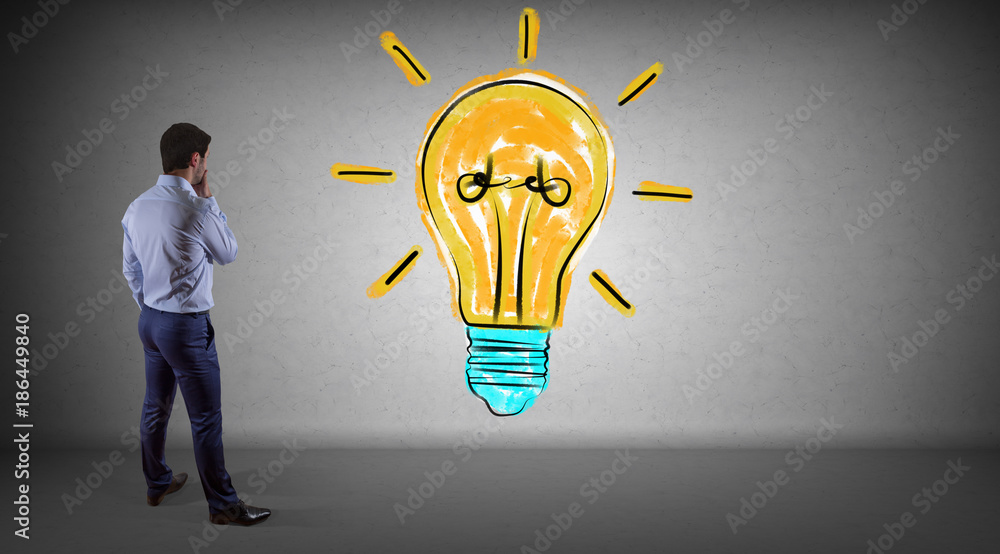 Poster businessman watching lightbulb sketch on a wall 3d rendering