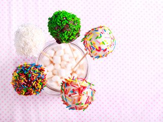 Colorful cake pops with sprinkles