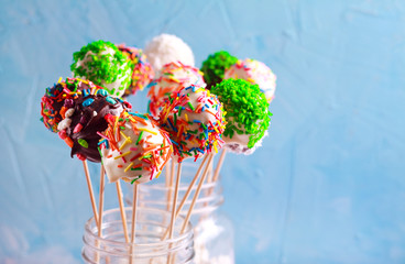 Colorful cake pops with sprinkles