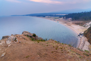 View on the Sarayskiy Bay and beach at sunrise. Lake Baikal. Olkhon Island. Russia