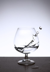 A splash of water in a glass