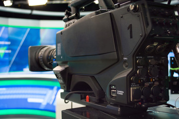 tv news studio with camera and lights