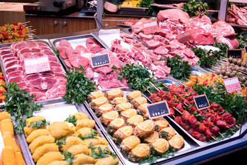 Raw meat in butcher's shop showcase