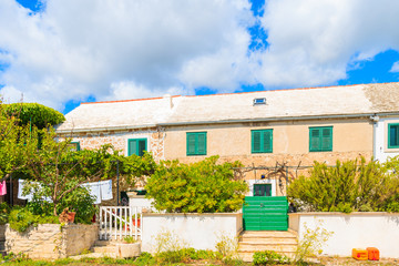 Traditional rustic stone house in Bol town, Brac island, Croatia