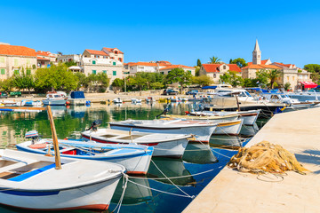 Colorful typical fishing boats anchoring in Sumartin port on Brac island, Croatia