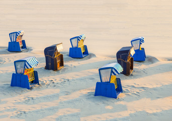 beach chairs in morning light at the beach