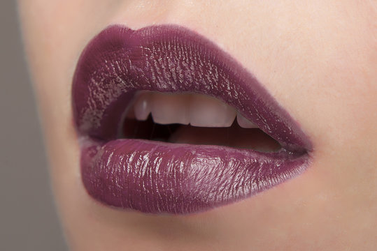 Lips With Plum Lipstick Close-up