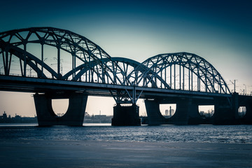 Darnitsky bridge, city winter sunset panorama, Kyiv, Ukraine