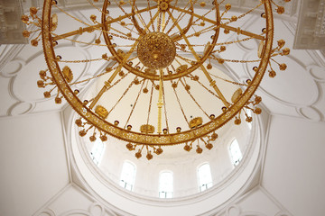 beautiful golden chandelier in an orthodox temple closeup