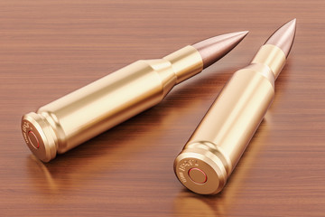 Bullets on the wooden table. 3D rendering