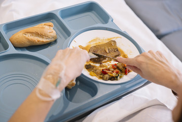 woman eating in the hospital
