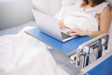 Fototapeta premium woman with laptop in the hospital