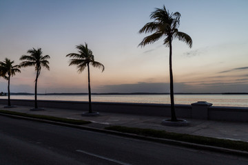 Evening view of Malecon (seaside drive) in Cienfuegos, Cuba.