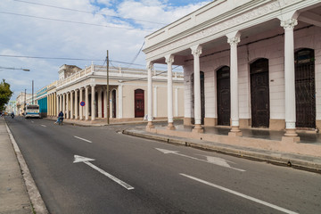 Fototapeta premium CIENFUEGOS, CUBA - FEBRUARY 10, 2016: Paseo del Prado street in Cienfuegos, Cuba.