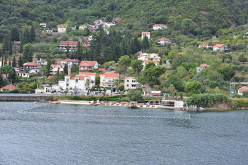 Fototapeta na wymiar Modern apartments and swimming pool of Kotor, Montenegro