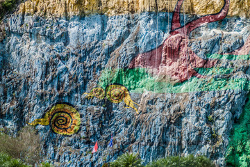 Mural de la Prehistoria (The Mural of Prehistory) painted on a cliff face in the Vinales valley, Cuba.