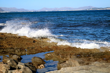 Sea rocks with waves