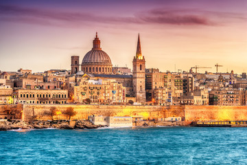 Valletta, Malta: skyline from Marsans Harbour at sunset. The cathedral - 186470415