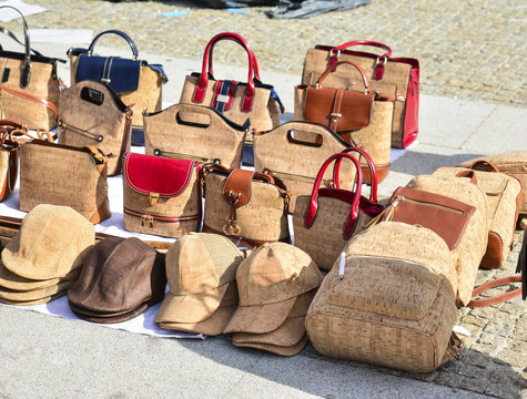 Variety of bags and souvenirs made from oak cork at the street market at  Lisbon, Portugal. Stock Photo | Adobe Stock