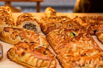 Russian pirozhki or stuffed puff pastry