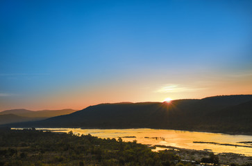 PHA Taem, Khong Chiam, Ubon ,Thailand , THE first Sunrise in siam on December,01,2018 in PHA Taem, Khong Chiam, Ubon ,Thailand.