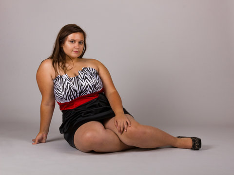 Beautiful Curvy Teenage Girl in White and Black Striped Dress with Black Shoes