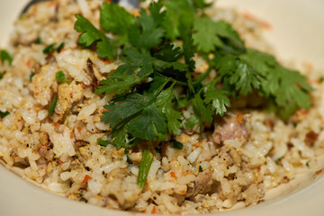 closeup garlic fried rice sprinkle with coriander .