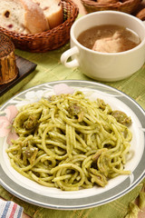 Traditional spaghetti  with clams and pesto 
